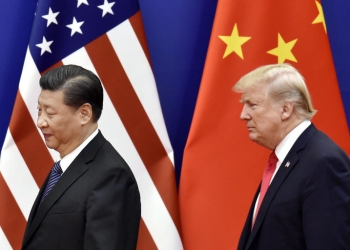 File photo taken in November 2017 shows U.S. President Donald Trump (R) and Chinese President Xi Jinping at the Great Hall of the People in Beijing. (Kyodo via AP Images) ==Kyodo